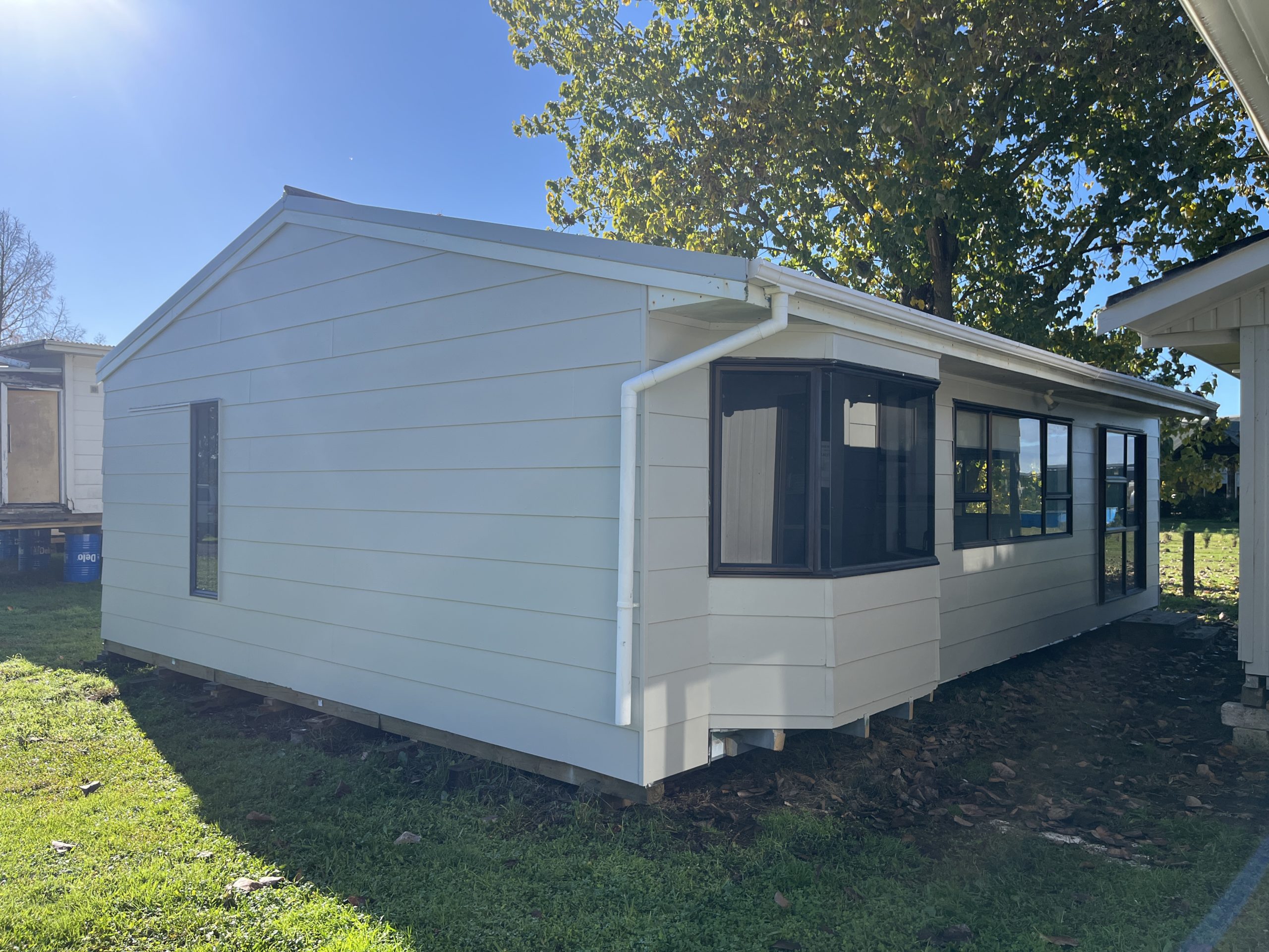 PRICE INCLUDES HOUSE + SHIFT + DESIGN* Cute Beach House Or Farmers Cottage – ID 193WAIHIBEACH Cover Image